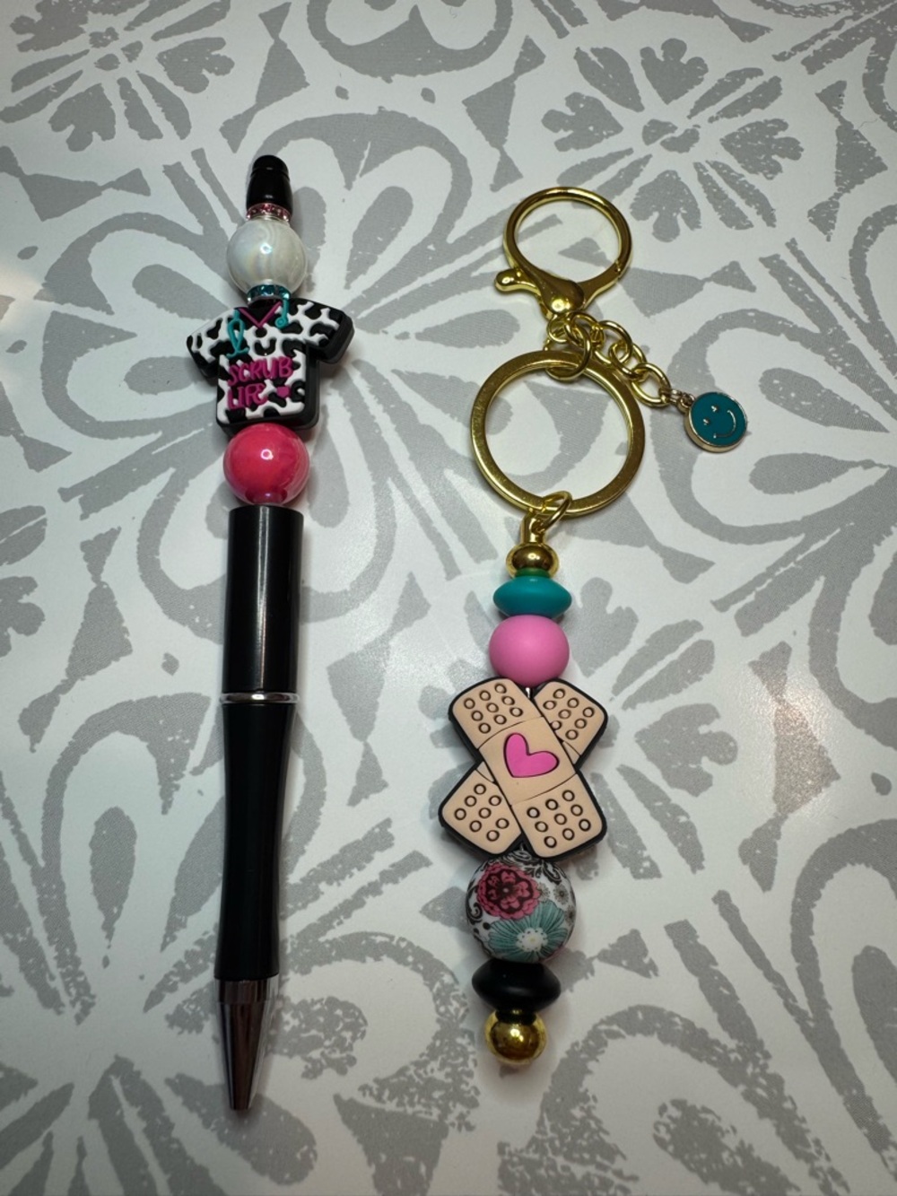 Gold Key Ring with Pink & Turquoise Beaded Bandage Charm